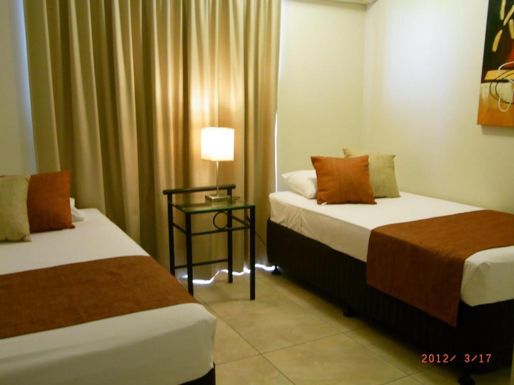 Coral Towers Holiday Suites Cairns Quarto foto